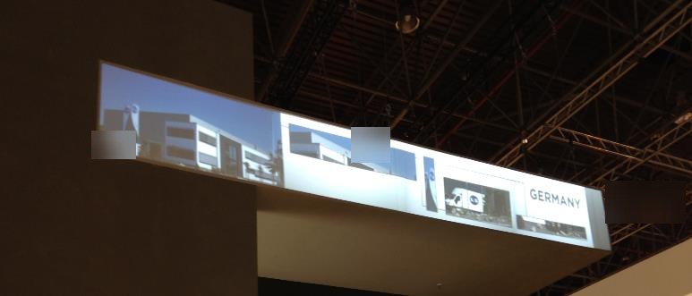 Il video mapping sui pannelli sospesi in fiera